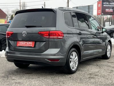 VOLKSWAGEN TOURAN 1.5 TSI ACT IQ.Drive DSG [7 személy] M.o-i. Távtartó Bluetooth Ülésfűtés Kamera Gyönyörű állapotban!